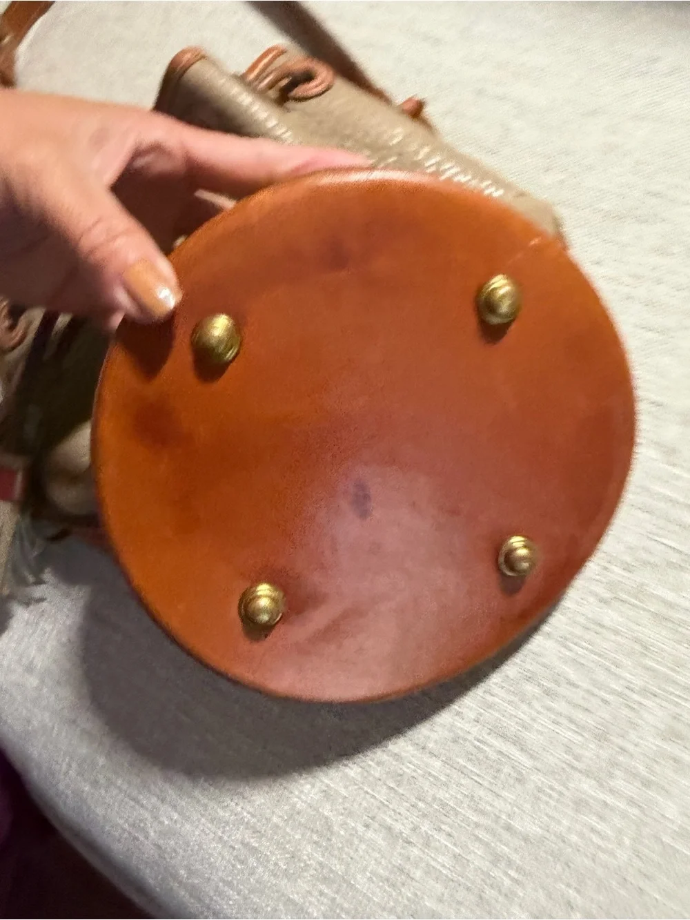 Dooney & Bourke Taupe Pebbled Leather Bucket Bag with Tan Trim